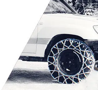 front side of a 4x4 with snow chains on