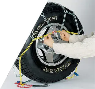 someone fitting snow chains